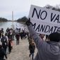 Protesters gather for a rally against COVID-19 vaccine mandates in front of the Lincoln Memorial in Washington, Sunday, Jan. 23, 2022. (AP Photo/Patrick Semansky)