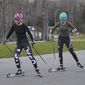 Annika Malacinski, left, and Alexa Brabec take part in a roller ski training session for the 2022 U.S. Olympic team for Nordic combined and ski jumping teams at Mount Van Hoevenberg Olympic Sports Complex in Lake Placid, N.Y., Thursday, Nov. 4, 2021. Even before the U.S. teams were set for Beijing Games, 20-year-old Annika Malacinski knew she had no shot at competing in China because she is a woman. Nordic combined, which combines ski jumping and cross-country skiing, is the only Olympic sport without gender equity. (AP Photo/Hans Pennink)