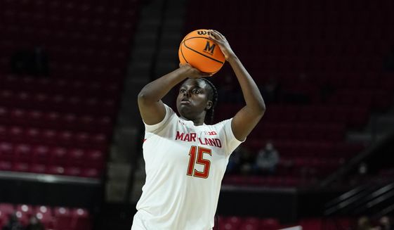 Maryland guard Ashley Owusu shoots a basket against Northwestern during the second half of an NCAA college basketball game, Sunday, Jan. 23, 2022, in College Park, Md. Maryland won 87-59. (AP Photo/Julio Cortez) **FILE**