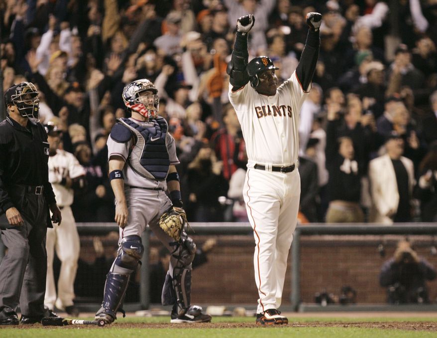 San Francisco Giants&#x27; Barry Bonds celebrates after hitting his 756th career home run against the Washington Nationals during the fifth inning of their baseball game in San Francisco, on Aug. 7, 2007. Barry Bonds, Roger Clemens and David Ortiz appear to be the only players with a chance at Hall of Fame enshrinement when results are unveiled Tuesday, Jan. 25, 2022, with Ortiz most likely to get in on his first try. Bonds and Clemens are each in their 10th and final turns under consideration by voters from the Baseball Writers&#x27; Association of America. (AP Photo/Eric Risberg, file) **FILE**