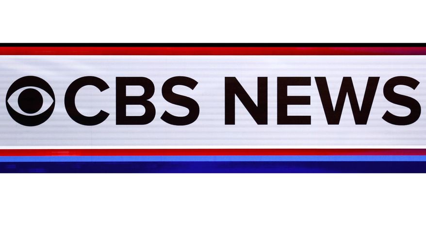The CBS News Logo appears on stage at a Democratic presidential primary debate on Feb. 25, 2020, in Charleston, S.C.. CBS News says it is retooling its streaming service to better incorporate programs and personalities from the television network. The service debuts a new evening newscast on Monday, Jan. 24, 2022, along with a series of prime-time programs that make use of work done on "60 Minutes," "CBS Sunday Morning" and other shows (AP Photo/Patrick Semansky, File)