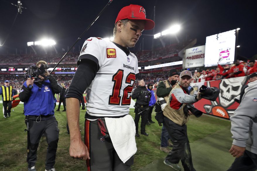 Tampa Bay Buccaneers quarterback Tom Brady (12) reacts as he leaves the field after the team lost to the Los Angeles Rams during an NFL divisional round playoff football game Sunday, Jan. 23, 2022, in Tampa, Fla. (AP Photo/Mark LoMoglio) **FILE**