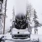 A machine blows snow at Vail Mountain Resort, Wednesday, Dec. 29, 2021, in Vail, Colo. Newer snowmaking technology is allowing ski areas to be more efficient with energy and water usage as climate change continues to threaten snowpack levels. (AP Photo/Brittany Peterson) **FILE**