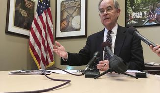 Rep. Jim Cooper, D-Tenn., talks to reporters at his Nashville office, on Feb. 16, 2018. Cooper says he won&#39;t run for reelection after serving in elected office for more than 30 years. Cooper announced that there was &quot;no way&quot; for him to win his seat under a new congressional map drawn up by state Republicans. (AP Photo/Jonathan Mattise, File)