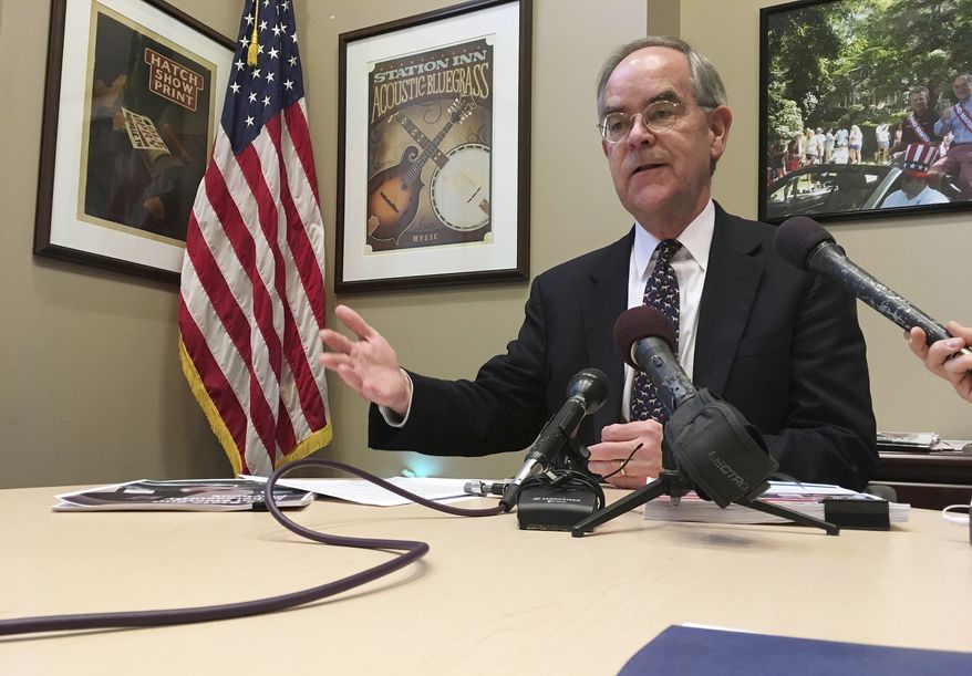 Rep. Jim Cooper, D-Tenn., talks to reporters at his Nashville office, on Feb. 16, 2018. Cooper says he won&#39;t run for reelection after serving in elected office for more than 30 years. Cooper announced that there was &quot;no way&quot; for him to win his seat under a new congressional map drawn up by state Republicans. (AP Photo/Jonathan Mattise, File)
