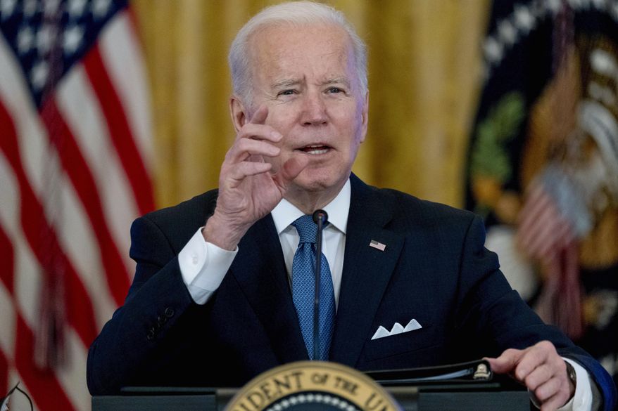 President Joe Biden responds to reporter's questions during a meeting on efforts to lower prices for working families, in the East Room of the White House in Washington, Monday, Jan. 24, 2022. (AP Photo/Andrew Harnik)