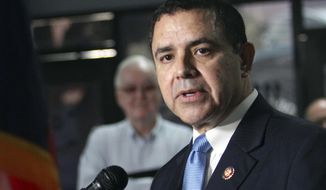 U.S. Rep. Henry Cuellar, D-Laredo, speaks during a press conference at the southern border at the Humanitarian Respite Center on Friday, July 19, 2019 in McAllen, Texas. FBI agents searched near the Texas home of Cuellar on Wednesday, Jan. 19, 2022, as they conducted what an agency spokeswoman called “court-authorized law enforcement activity.”  The motive and scope of the search was not immediately known.  (Delcia Lopez/The Monitor via AP, File)