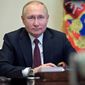 Russian President Vladimir Putin in Moscow, Russia, Tuesday, Jan. 25, 2022. (, Sputnik, Kremlin Pool Photo via AP)