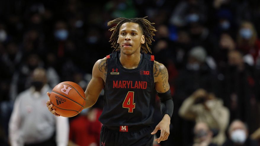 Maryland guard Fatts Russell (4) dribbles the ball against Rutgers during the first half of an NCAA college basketball game in Piscataway, N.J. Wednesday, Jan. 25, 2022. (AP Photo/Noah K. Murray)  **FILE**