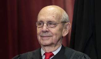 Supreme Court Associate Justice Stephen G. Breyer, appointed by President Bill Clinton, sits with fellow Supreme Court justices for a group portrait at the Supreme Court Building in Washington, Nov. 30, 2018. Breyer is retiring, giving President Joe Biden an opening he has pledged to fill by naming the first Black woman to the high court, two sources told The Associated Press Wednesday, Jan. 26, 2022. (AP Photo/J. Scott Applewhite, File)