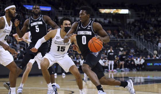 Georgetown&#39;s Aminu Mohammed (0) drives to the basket as Providence&#39;s Justin Minaya (15) defends during the second half of an NCAA college basketball game Thursday, Jan. 20, 2022, in Providence, R.I. (AP Photo/Stew Milne) **FILE**