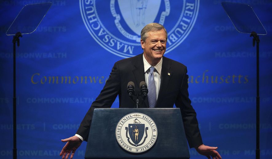 Massachusetts Gov. Charlie Baker leans forward and says, &amp;quot;I miss you, man!&amp;quot; referencing former Boston Mayor and current Secretary of Labor Marty Walsh as he delivers the State of the Commonwealth address, Tuesday, Jan. 25, 2022, at the Hynes Convention Center in Boston. (Barry Chin/The Boston Globe via AP)