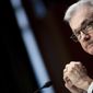 Federal Reserve Board Chairman Jerome Powell listens during his re-nominations hearing before the Senate Banking, Housing and Urban Affairs Committee, Tuesday, Jan. 11, 2022, on Capitol Hill in Washington.  (Brendan Smialowski/Pool via AP)