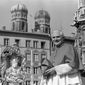With the towers of Munich&#39;s cathedral in the background, Cardinal Joseph Ratzinger, later Pope Benedict XVI, bids farewell to the Bavarian believers in downtown Munich, Germany, Sunday, Feb. 28, 1982. The Vatican on Wednesday, Jan. 26, 2022 strongly defended Pope Benedict XVI’s record in fighting clergy sexual abuse and cautioned against looking for “easy scapegoats and summary judgments,” after an independent report faulted his handling of four cases of abuse when he was archbishop of Munich, Germany.  (AP Photo/Dieter Endlicher, File)