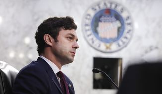 Sen. Jon Ossoff, D-Ga., listens during a Senate Banking, Housing and Urban Affairs Committee hearing on the CARES Act on Capitol Hill, Tuesday, Sept. 28, 2021, in Washington. (Kevin Dietsch/Pool via AP) **FILE**