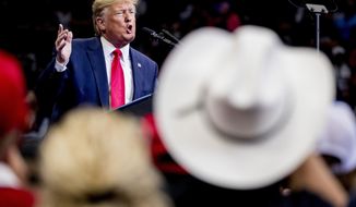 In this Oct. 17, 2019, file photo President Donald Trump speaks at a campaign rally at American Airlines Arena in Dallas, Texas. (AP Photo/Andrew Harnik, File)