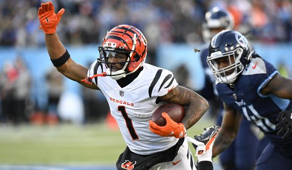 Cincinnati Bengals wide receiver Ja&#39;Marr Chase (1) runs against the Tennessee Titans during the first half of an NFL divisional round playoff football game, Saturday, Jan. 22, 2022, in Nashville, Tenn. (AP Photo/Mark Zaleski) * * FILE**