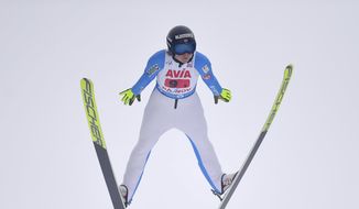 Norway&#39;s Maren Lundby competes in the mixed team ski jumping World Cup event in Rasnov, Romania, on Feb. 20, 2021. Lundby has emerged as an advocate for change in a sport that has historically had athletes develop eating disorders in a quest to be as light as possible to fly farther. (AP Photo/Raed Krishan, File) **FILE**