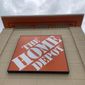A Home Depot logo sign hangs on its facade, Friday, May 14, 2021, in North Miami, Fla. (AP Photo/Wilfredo Lee, File)