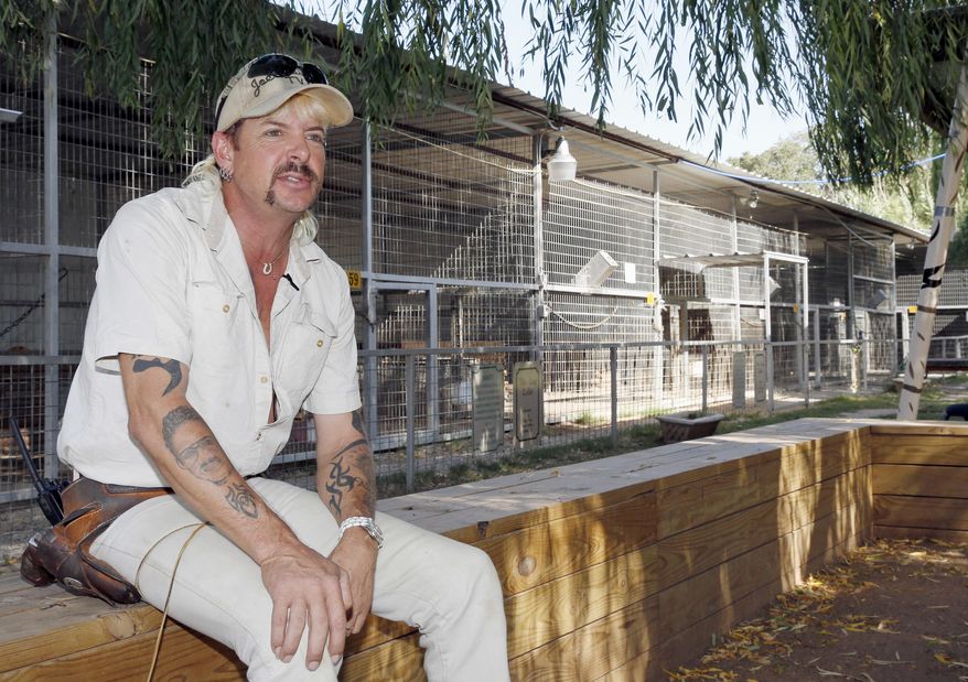 In this Aug. 28, 2013, file photo, Joseph Maldonado answers a question during an interview at the zoo he runs in Wynnewood, Okla. Maldonado known also as “Tiger King” Joe Exotic is headed to a federal courtroom Friday, Jan. 28, 2022, for a resentencing hearing. He&#39;s now in federal prison after a jury convicted him in a murder-for-hire plot involving his chief rival, Carole Baskin. (AP Photo/Sue Ogrocki, File)  **FILE**