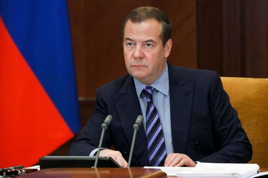 Russian Security Council Deputy Chairman Dmitry Medvedev attends a meeting in the Gorky residence outside Moscow, Russia, Thursday, Jan. 27, 2022. (Yekaterina Shtukina, Sputnik, Government Pool Photo via AP)