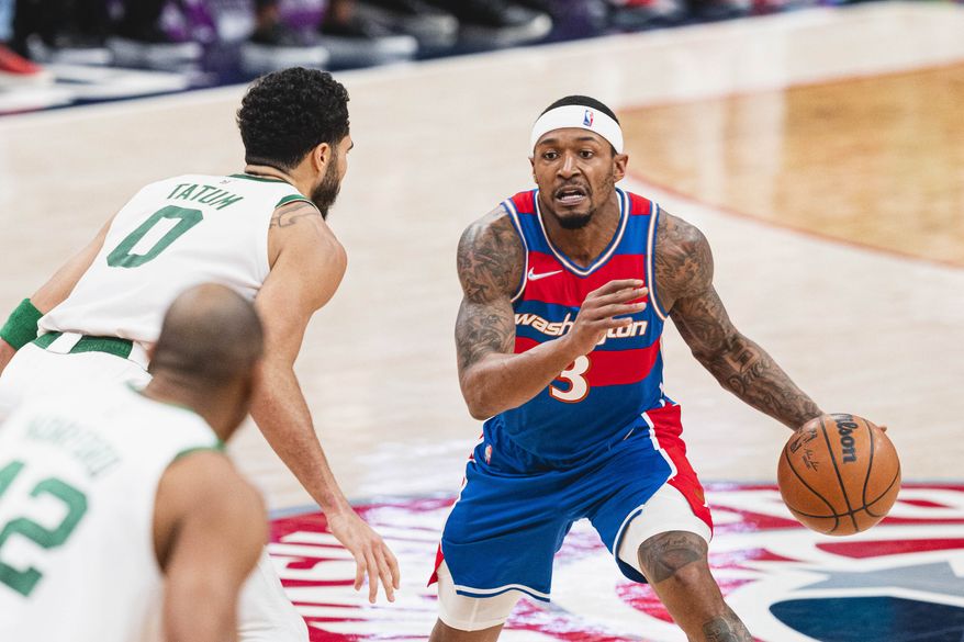 Washington Wizards Bradley Beal drives the ball against the Boston Celtics at the Capital One Arena in Washington D.C., Jan. 23, 2022. (Photo by All-Pro Reels)