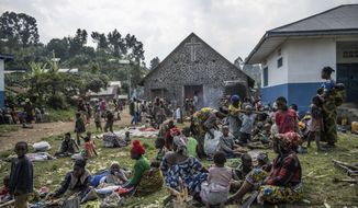 People fleeing the fighting between M23 forces and Congolese army find refuge in a church in Kibumba, north of Goma, Democratic Republic of Congo, Friday Jan. 28, 2022. In the past week, inhabitants from six villages in the country&#39;s east  including, Bukima, Nyesisi, and Ruhanga  have fled the violence. At least 2,000 people are now living in improvised shelters, in churches, schools or with host families. (AP Photo/Moses Sawasawa)