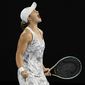 Ash Barty of Australia celebrates after defeating Danielle Collins of the U.S., in the women&#39;s singles final at the Australian Open tennis championships in Saturday, Jan. 29, 2022, in Melbourne, Australia. (AP Photo/Andy Brownbill)