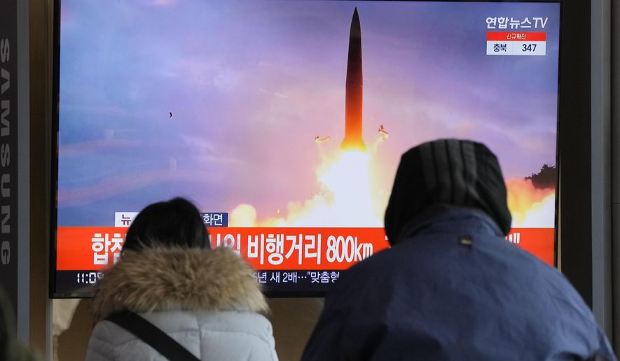 People watch a TV showing a file image of North Korea&#39;s missile launch during a news program at the Seoul Railway Station in Seoul, South Korea, Sunday, Jan. 30, 2022. North Korea on Sunday fired what appeared to be the most powerful missile it has tested since U.S. President Joe Biden took office, as it revives its old playbook in brinkmanship to wrest concessions from Washington and neighbors amid a prolonged stalemate in diplomacy. (AP Photo/Ahn Young-joon)