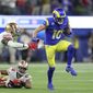 Los Angeles Rams&#39; Cooper Kupp (10) gets past San Francisco 49ers&#39; Jaquiski Tartt, left, and K&#39;Waun Williams (24) during the second half of the NFC Championship NFL football game Sunday, Jan. 30, 2022, in Inglewood, Calif. (AP Photo/Jed Jacobsohn)