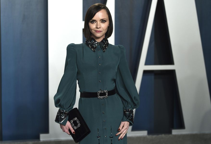 In this Feb. 9, 2020, photo, Christina Ricci arrives at the Vanity Fair Oscar Party in Beverly Hills, Calif. (Photo by Evan Agostini/Invision/AP) **FILE**