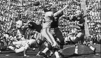 Green Bay Packers quarterback Bart Starr throws a pass during first quarter action in Super Bowl I against the Kansas City Chiefs at the Los Angeles Coliseum on Jan. 15, 1967. The Packers beat the Chiefs 35-10. (Los Angeles Times via AP, File) **FILE**