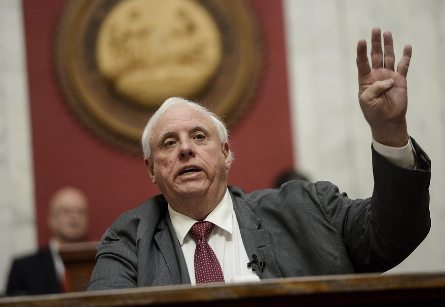 West Virginia Gov. Jim Justice gives his State of the State speech in the House Chambers, Thursday, Jan. 27, 2022, at the West Virginia State Capitol in Charleston, W.Va. (Chris Dorst/Charleston Gazette-Mail via AP) **FILE**