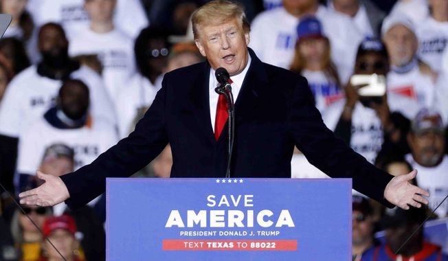 Former President Donald Trump speaks at a rally, Saturday, Jan. 29, 2022, in Conroe, Texas. (Jason Fochtman/Houston Chronicle via AP)