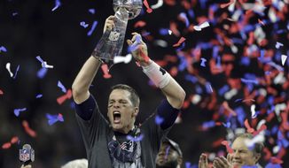 FILE - New England Patriots&#39; Tom Brady raises the Vince Lombardi Trophy after defeating the Atlanta Falcons in overtime at the NFL Super Bowl 51 football game, in Houston, Feb. 5, 2017. Tom Brady has retired after winning seven Super Bowls and setting numerous passing records in an unprecedented 22-year-career. He made the announcement, Tuesday, Feb. 1, 2022, in a long post on Instagram. (AP Photo/Darron Cummings, File)