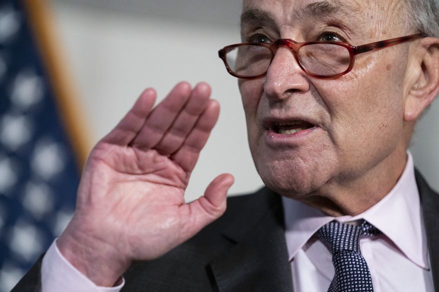 Senate Majority Leader Sen. Chuck Schumer of N.Y. speaks during a news conference on Capitol Hill, Tuesday, Feb. 1, 2022, in Washington. (AP Photo/Evan Vucci)