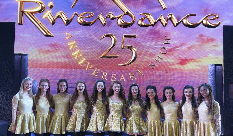 This undated image released by Abhann Productions Ltd. shows Morgan Bullock, a cast member of the Irish dance group Riverdance, right, with other female cast members. Bullock is the troupe’s first Black female dancer. (Abhann Productions Ltd./Polk & Co. via AP)