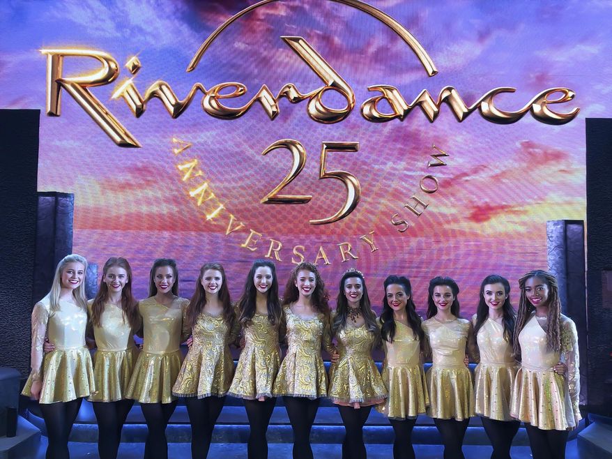 This undated image released by Abhann Productions Ltd. shows Morgan Bullock, a cast member of the Irish dance group Riverdance, right, with other female cast members. Bullock is the troupe’s first Black female dancer. (Abhann Productions Ltd./Polk & Co. via AP)