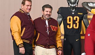 Joe Theismann and Dan Snyder pose with the Washington Commander uniforms at Washington Commanders team name and logo reveal event the  FedEx Field on February 2nd 2022 in Landover MD. (Reggie Hildred/All-Pro Reels)