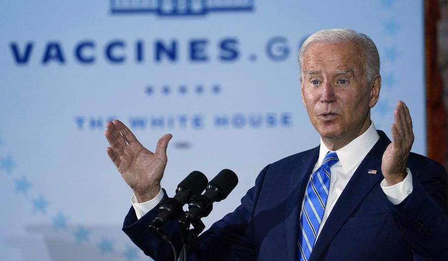 FILE - President Joe Biden speaks about COVID-19 vaccinations after touring a Clayco Corporation construction site for a Microsoft data center in Elk Grove Village, Ill., on Oct. 7, 2021. A group of states is renewing a challenge to a federal mandate that millions of healthcare workers across the U.S. be vaccinated against COVID-19. (AP Photo/Susan Walsh, File)