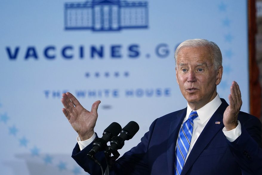 FILE - President Joe Biden speaks about COVID-19 vaccinations after touring a Clayco Corporation construction site for a Microsoft data center in Elk Grove Village, Ill., on Oct. 7, 2021. A group of states is renewing a challenge to a federal mandate that millions of healthcare workers across the U.S. be vaccinated against COVID-19. (AP Photo/Susan Walsh, File)