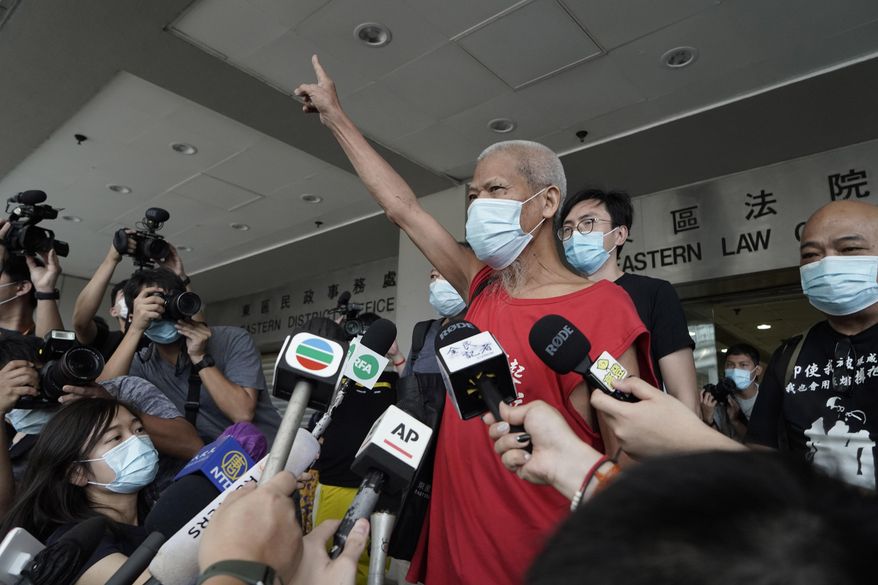 Hong Kong activist Koo Sze-yiu speaks to the media after arriving at a court in Hong Kong, Sept. 30, 2020. Koo Sze-yiu was arrested Friday, Feb. 4, 2022, days after he announced plans to protest the Beijing Winter Olympics outside government offices in the city, according to local media. (AP Photo/Kin Cheung, File)