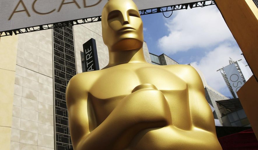 In this Feb. 21, 2015 file photo, an Oscar statue appears outside the Dolby Theatre for the 87th Academy Awards in Los Angeles. (Photo by Matt Sayles/Invision/AP, File)