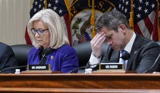 FILE - Rep. Liz Cheney, R-Wyo., and Rep. Adam Kinzinger, R-Ill., listen as the House select committee tasked with investigating the Jan. 6 attack on the U.S. Capitol meets on Capitol Hill in Washington, Oct. 19, 2021. Republican Party officials have voted to punish Cheney and Kinzinger and advanced a rule change that would prohibit candidates from participating in presidential debates organized by the Commission on Presidential Debates. GOP officials took a voice vote to approve both measures at the Republican National Committee’s winter meeting in Salt Lake City. (AP Photo/J. Scott Applewhite, File)