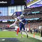 AFC wide receiver Stefon Diggs (14), of the Buffalo Bills, and NFC cornerback Trevon Diggs (7), of the Dallas Cowboys, leap during an incomplete pass during the second half of the Pro Bowl NFL football game at Allegiant Stadium, Sunday, Feb. 6, 2022, in Las Vegas. (AP Photo/David Becker)