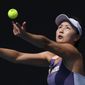 China&#39;s Peng Shuai serves to Japan&#39;s Nao Hibino during their first round singles match at the Australian Open tennis championship in Melbourne, Australia, on Jan. 21, 2020. (AP Photo/Andy Brownbill, File) **FILE**