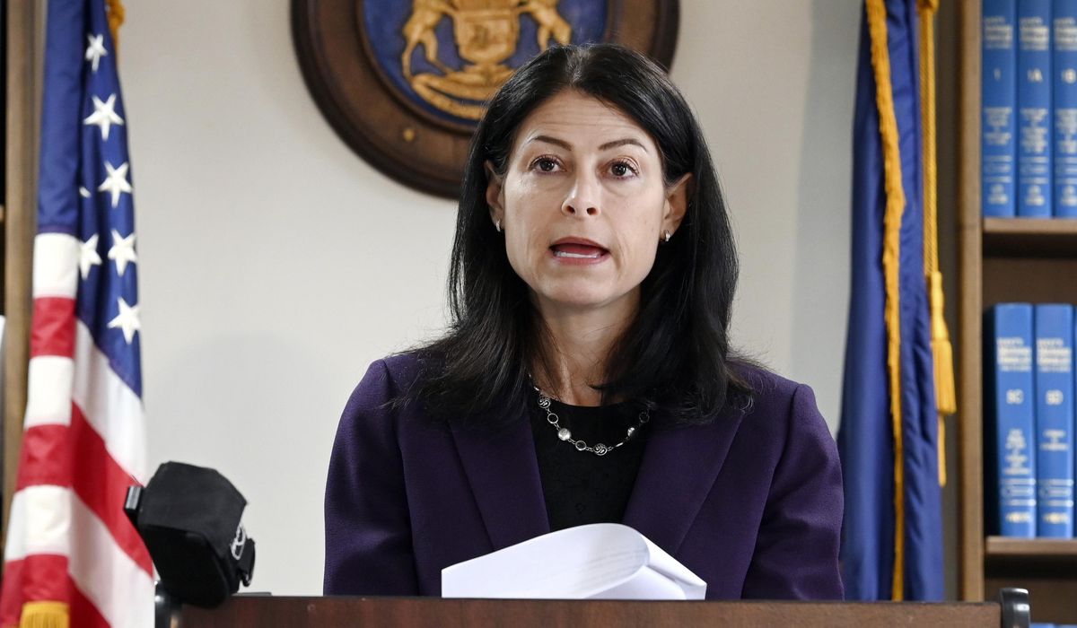 NextImg:Michigan charges 16 fake Trump electors with election law, forgery felonies