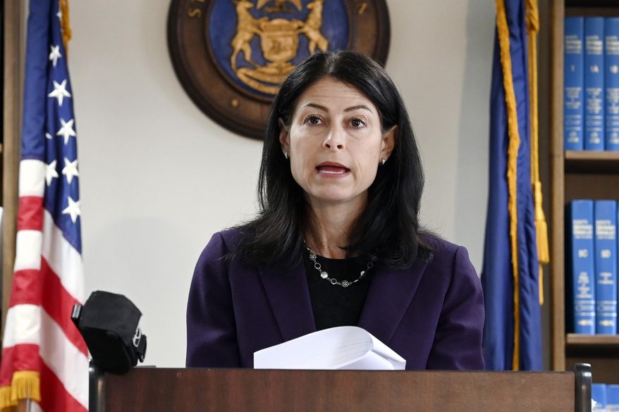 Michigan Attorney General Dana Nessel speaks during a news conference in Detroit on Oct. 14, 2021. The false claims that the 2020 election was stolen from former President Donald Trump and protecting future election results loom large over this year’s races for state attorneys general. Candidates who support Trump’s position are angling to unseat Democratic incumbents in political swing states – and in some cases, knock out moderate attorneys general in GOP primaries. (Max Ortiz/Detroit News via AP, File)
