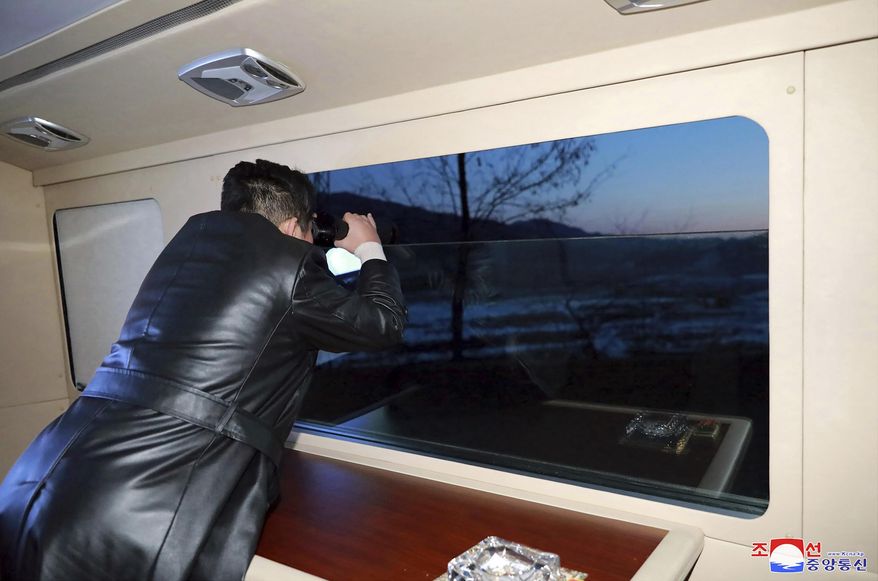 This photo provided by the North Korean government shows North Korean leader Kim Jong-un watches what it says a test launch of a hypersonic missile on Jan. 11, 2022 in North Korea. Independent journalists were not given access to cover the event depicted in this image distributed by the North Korean government. The content of this image is as provided and cannot be independently verified. Korean language watermark on image as provided by source reads: "KCNA" which is the abbreviation for Korean Central News Agency. (Korean Central News Agency/Korea News Service via AP)