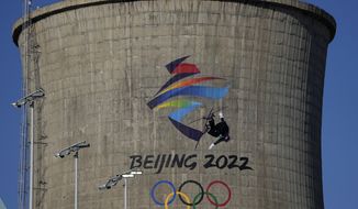 Eileen Gu, of China, competes during the women&#39;s freestyle skiing big air finals of the 2022 Winter Olympics, Tuesday, Feb. 8, 2022, in Beijing. (AP Photo/Jae C. Hong)